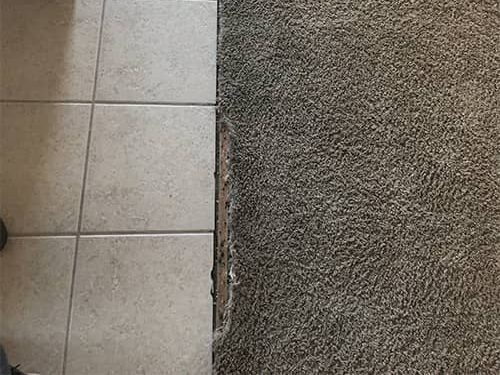 torn carpet needs repaired