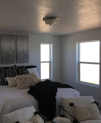 room without blinds or ceiling fan